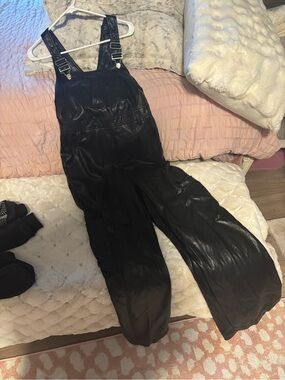 Anthropologie Black Jumpsuit I have one small and one medium